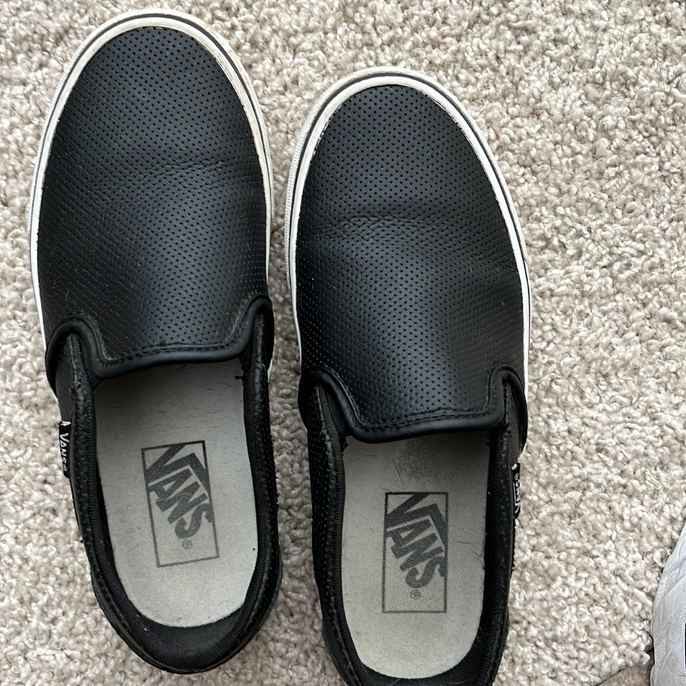Vans black slip ons